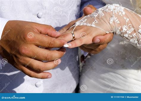 wedding rings  fingers stock photo image  bouquet