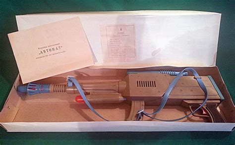 Игрушка электронная ''Автомат''.