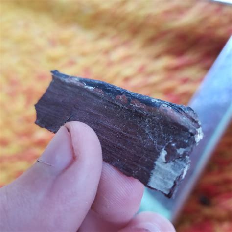 Material on outside windowsill of my very old house. Breaks very easily