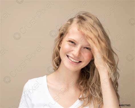 Beautiful young girl laughing Pretty blonde with curly hair in - stock ...