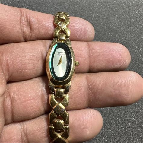 citizen elegance womens gold tone green crystal depop