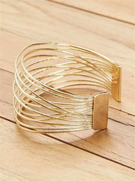 brazalete beige kiabi