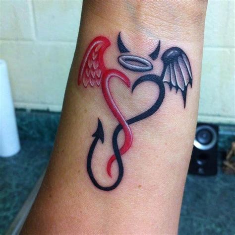 Pin on Tattoos! | Angel devil tattoo, Devil tattoo, Hand tattoos