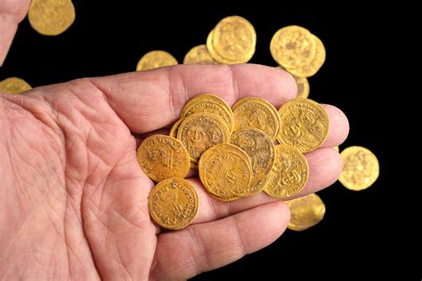 dozens  pure gold coins discovered  secret cache dating  muslim