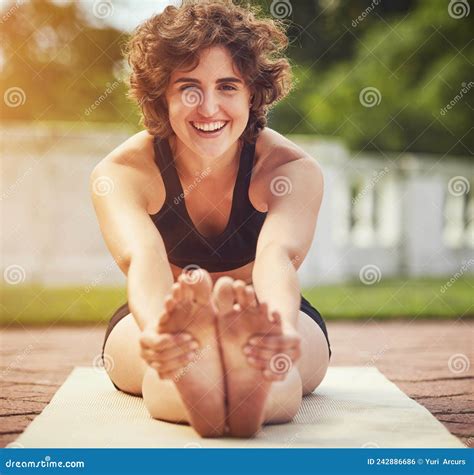 You Know Youre Fit when You Can Touch Your Toes. Shot of an Attractive