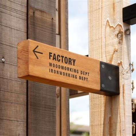 Wood wayfinding | Shop signage, Exterior signage, Signage design