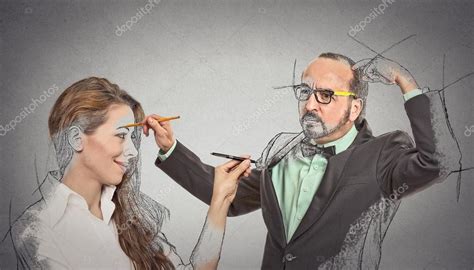 Woman, middle aged guy drawing picture sketch of each other Stock Photo by ©SIphotography 57126977