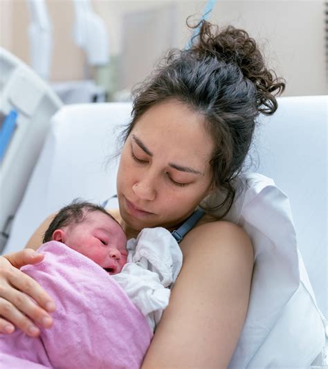 Postpartum Cramping: What Causes "After Pains" & How To Get Relief