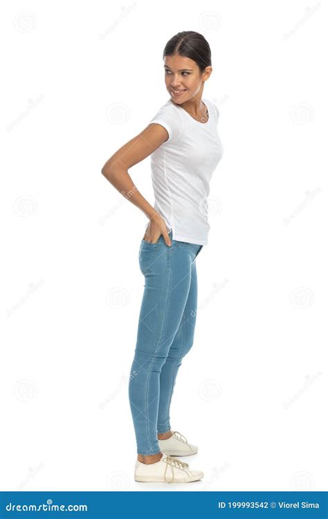 Side View of Happy Casual Woman Looking Over Shoulder Stock Photo ...