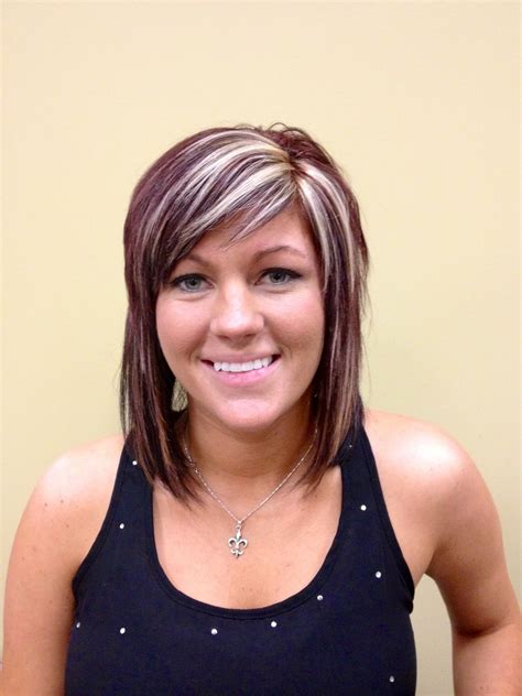 Trying burgundy hair color with blonde highlights offers bold contrast 33