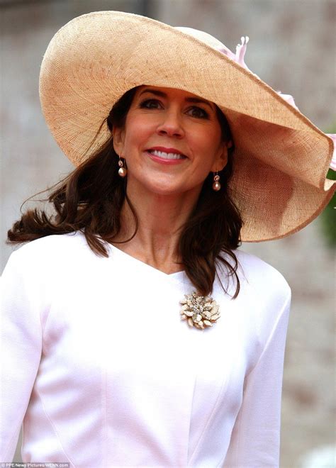Princess mary gets giggly with businessman while christening a ship ...