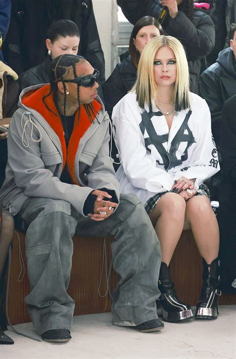 Avril Lavigne & Tyga Confirm Romance With Kiss At Paris Fashion Week ...