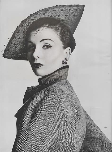 Chic in Silk — US Vogue February 15, 1952 Suzy Parker wears a...
