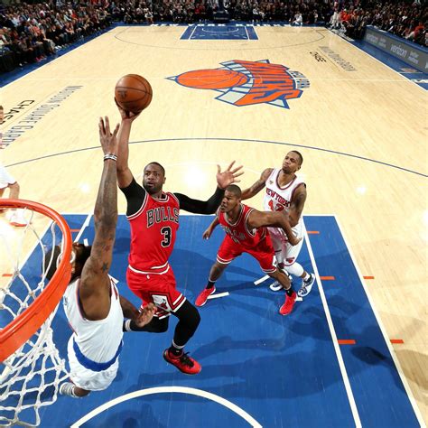 Dwyane Wade Soars for Dunk as Justin Holiday Avoids the Poster | News ...