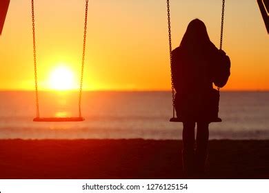 Single Woman Alone Swinging On Beach Stock Photo 250745014 | Shutterstock