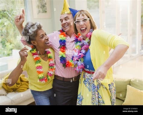 Mature adults at party hi-res stock photography and images - Alamy