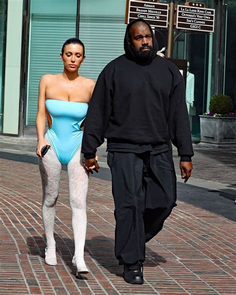 Bianca Censori Wears Strapless Blue Bodysuit on Movie Date with Kanye