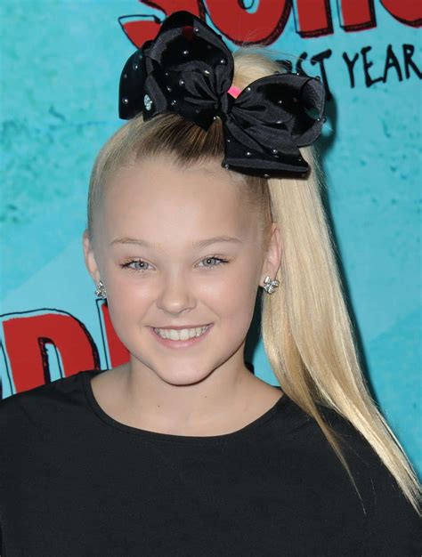 Download Jojo Siwa and her Signature Big Bow | Wallpapers.com