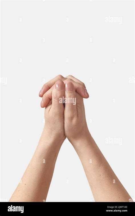 Two female hands in hand lock on white Stock Photo - Alamy