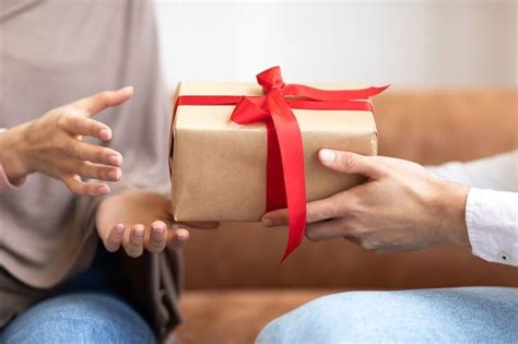 Muslim Couple Exchanging Gifts