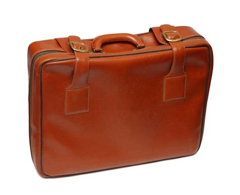 premium photo  brown suitcase
