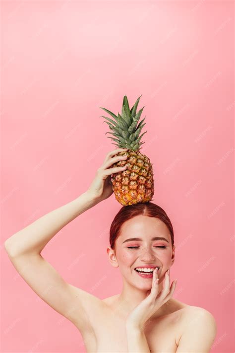 Free Photo | Nude girl with pineapple smiling with closed eyes. Studio