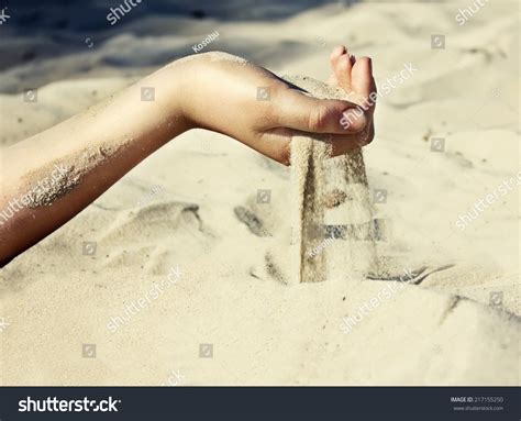 Sand Is Pouring Through Girl'S Fingers, Symbol Of Transience Of Life ...