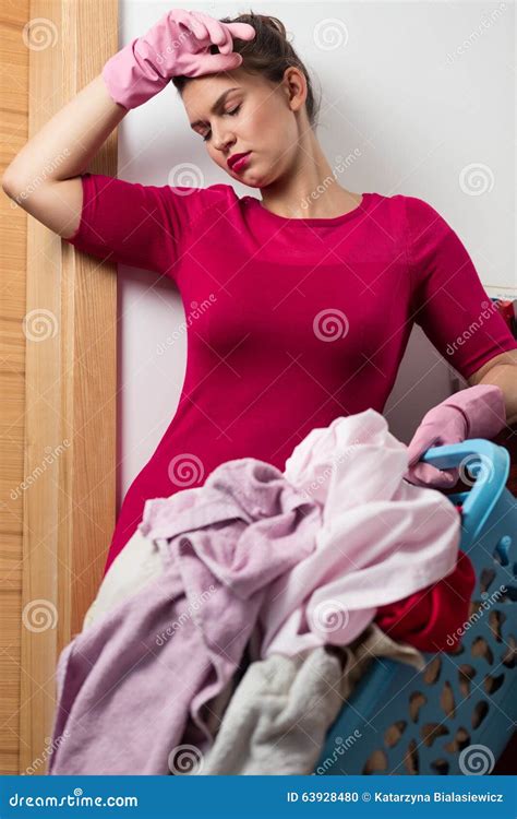 tired woman  laundry stock photo image  housework