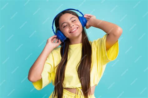 premium photo teen girl  headphones listen   wireless
