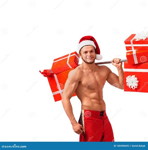 Fit Naked Santa Claus with a Barbell Full of Presents Stock Image
