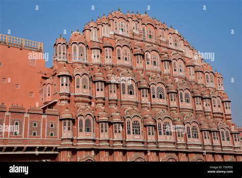 beautifully ornate red  pink sandstone facade  hawa mahal