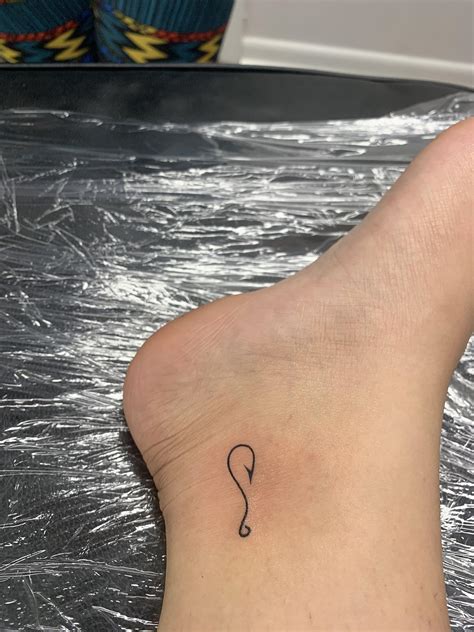 simple fishing tattoo 4