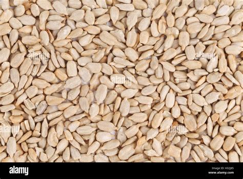 Peeled sunflower seeds close up Stock Photo - Alamy