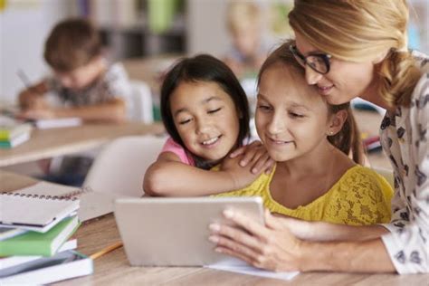 teacher  showing   students   smile