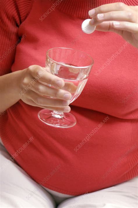 pregnant woman   tablet stock image  science