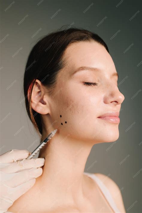 Premium Photo | Bruxism facial marking for a treatment with botulinum