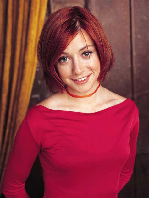 Download Alyson Hannigan posing for a portrait Wallpaper | Wallpapers.com