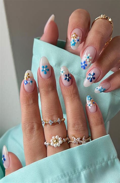 cute spring nail art inspirations milky mani blue flowers