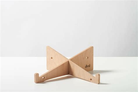 wooden laptop stand stood