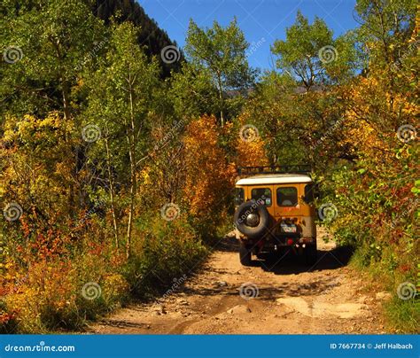 Dirt road and Jeep stock photo. Image of silver, jeep - 7667734