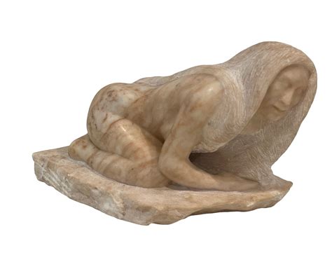carved white stone sculpture   crouching native  inuit american