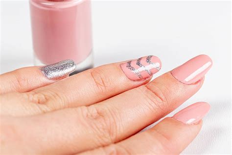 Manicure and beauty concept. Woman showing her beautiful manicure ...