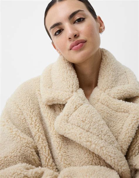 Long faux shearling coat - Women | Bershka
