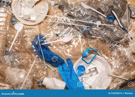 Pile of Different Plastic Waste on Wooden Surface Stock Photo - Image ...