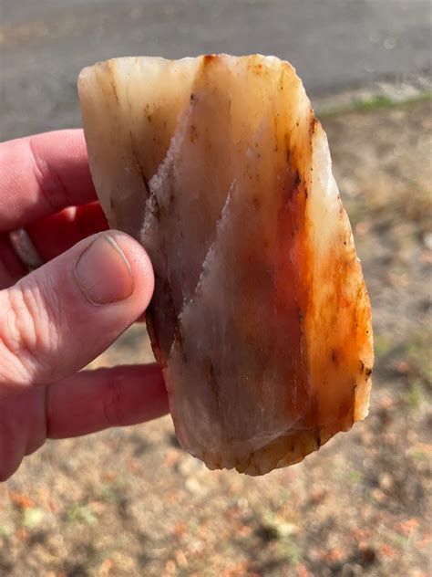 Roadside outcrop of calcareous siltstone showing spheroidal weathering