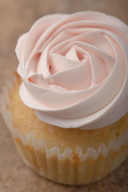 premium photo  single vanilla cupcake