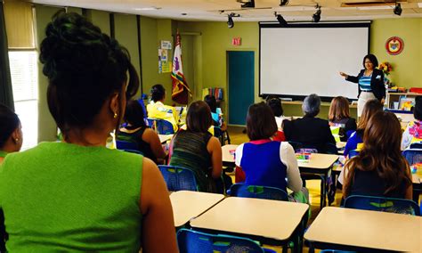 Lexica - A well dressed latina executive principals training a room
