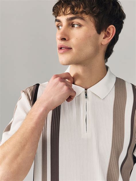 Buy Neutral/White Vertical Stripe Quarter Zip Polo Shirt from the Next