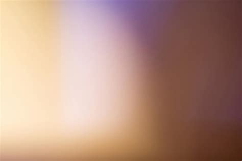 Blurry Image of a Brownish Background · Free Stock Photo