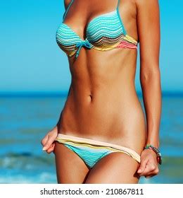 part beautiful woman sunbathing pink underwear stock photo